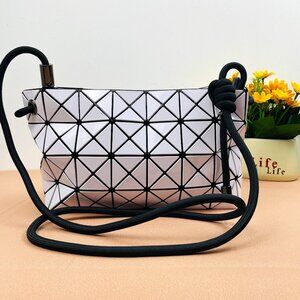 Brand new Issey Miyake white knotted tofu sling bag.